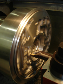 CNC lathe repairing a Ford pump
