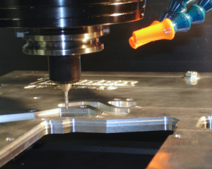 CNC mill building new test plate designed by Tanner Transmissions, Inc.